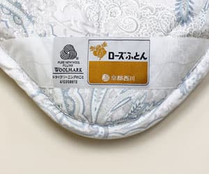 京都西川ウール敷き布団ロゴ